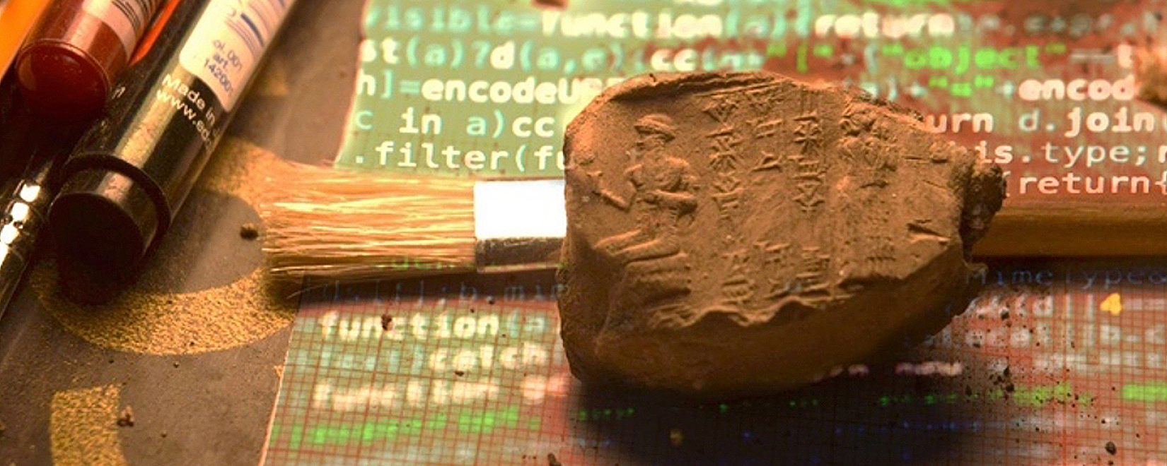 Ancient West Asian clay sealing with cuneiform on printed programming code – representing the KIŠIB digital corpus project.
